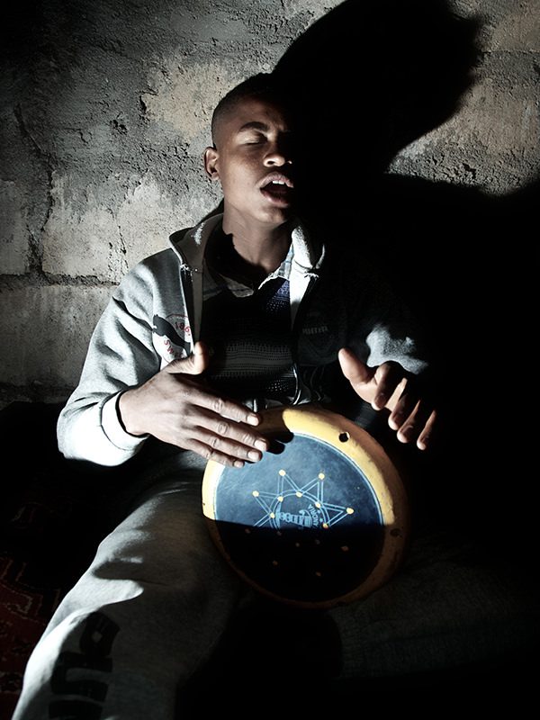 Person Playing a Hand Drum